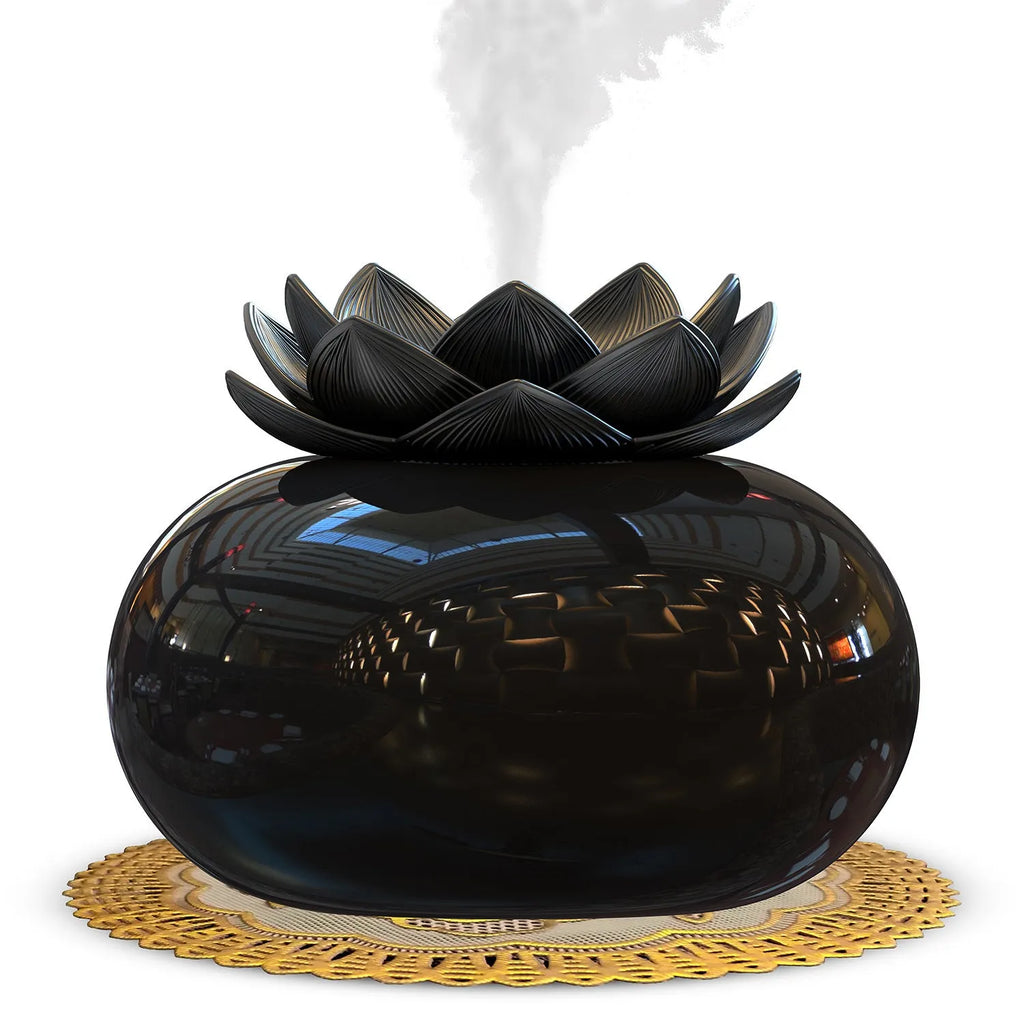 Pure black round lotus aromatherapy humidifier with USB cable and ceramic stone.