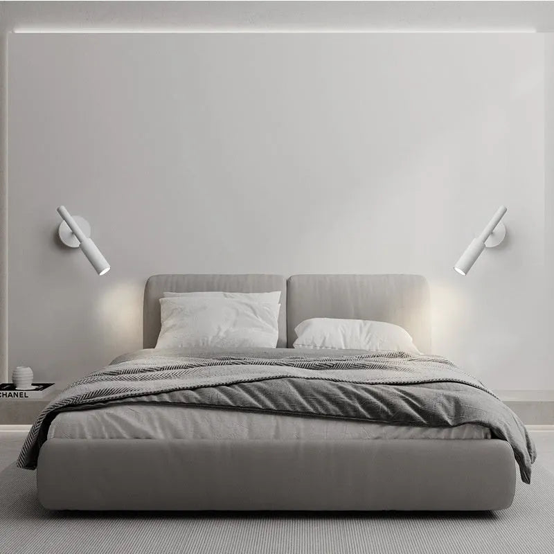 Modern minimalist wrought iron wall lamp in black or white with adjustable three-colour lighting.