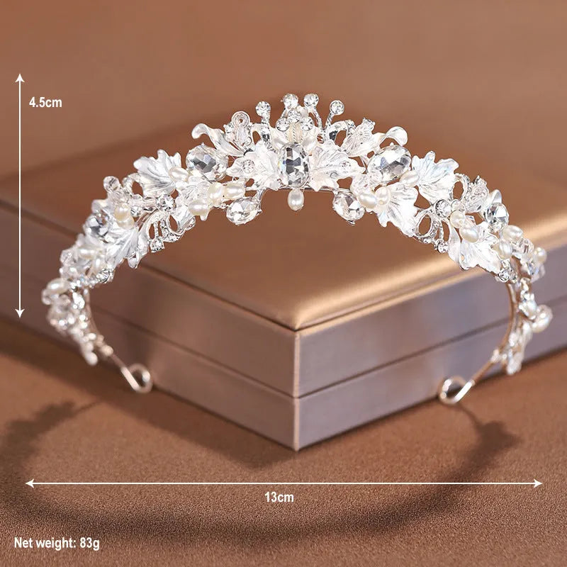 Pearl-decorated alloy crown headdress hair accessory in a gold electroplated finish.