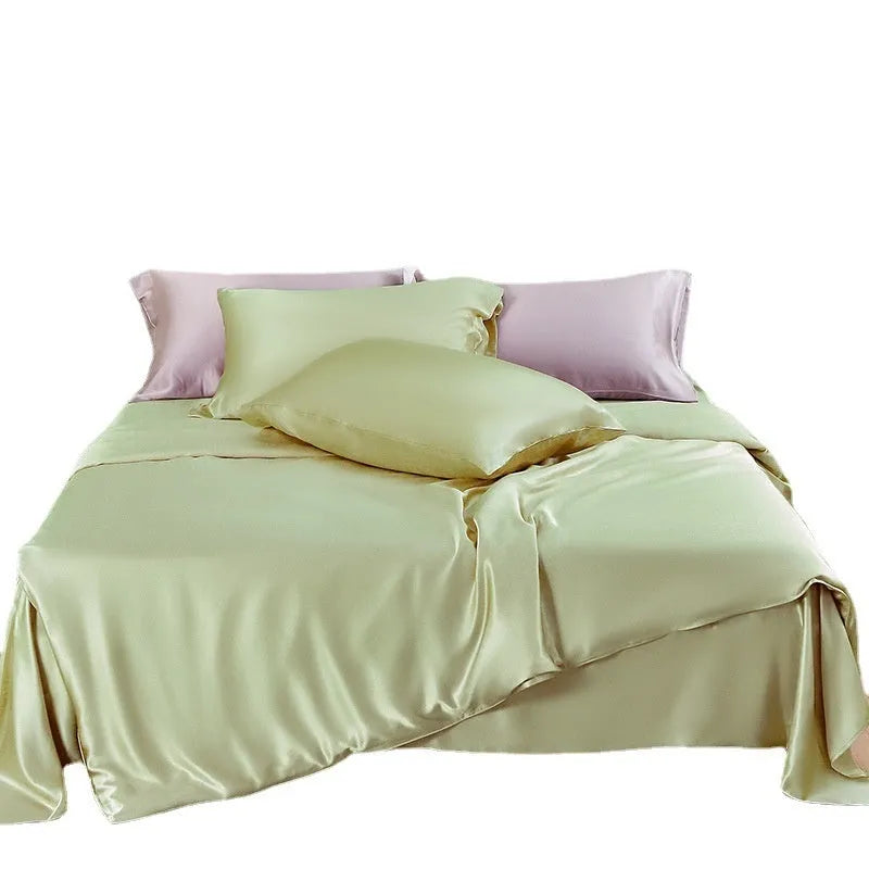 Reversible solid colour silk duvet cover shown in lotus pink, double-sided design.