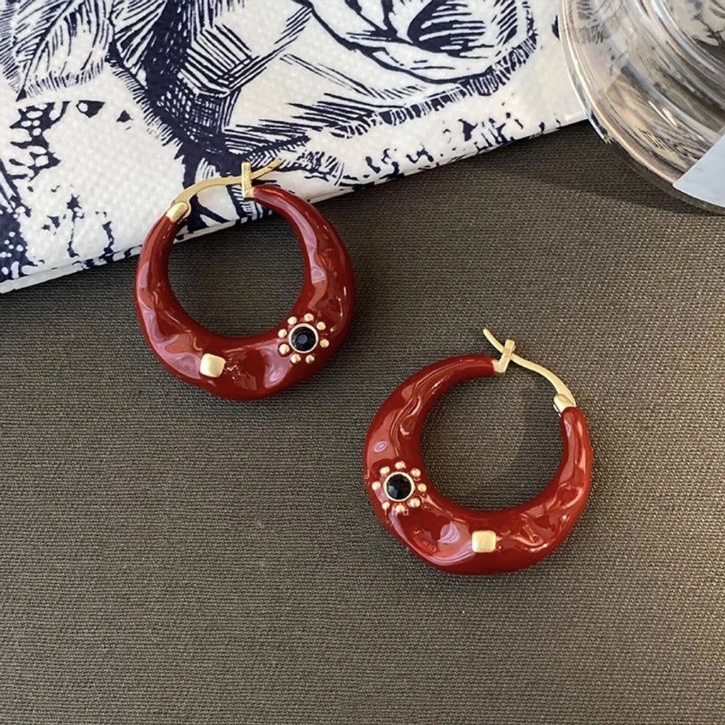 Hong Kong style retro ear studs with dripping oil finish and rhinestone inlay in black and red colours