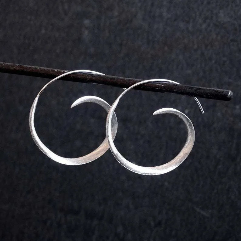 Gold alloy ear studs with round spiral leaf geometric design for women