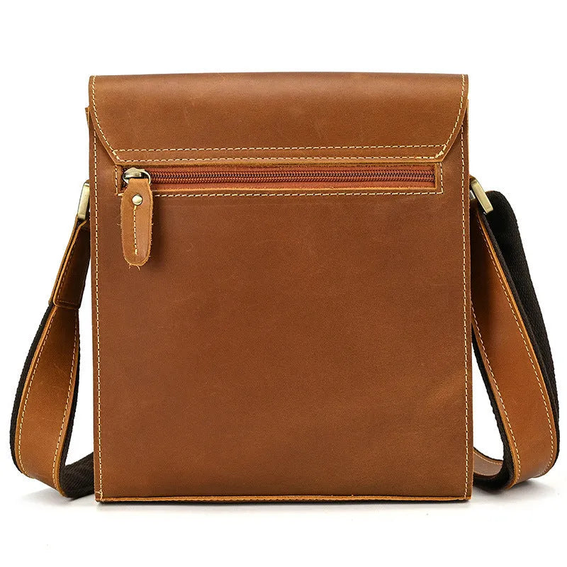 Men's dark brown Crazy Horse leather crossbody bag with visible stitching, shown holding A4 documents.