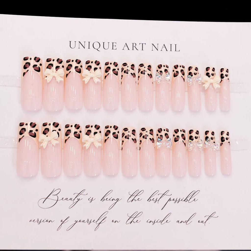 Leopard print butterfly shaped plastic nail art decorations in WM296 colour, pack of 60 pieces.