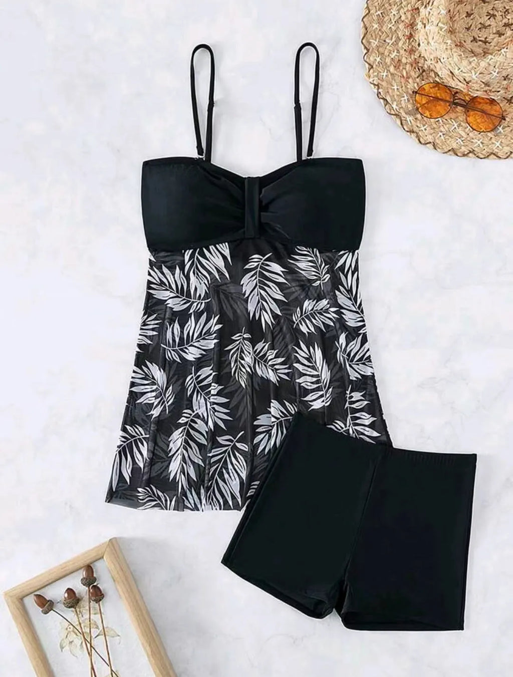 Women's high-waist mesh swimsuit briefs in black, blue and peacock green colours.