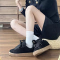 Black retro low-top sneakers with waterproof platform sole and artificial PU upper