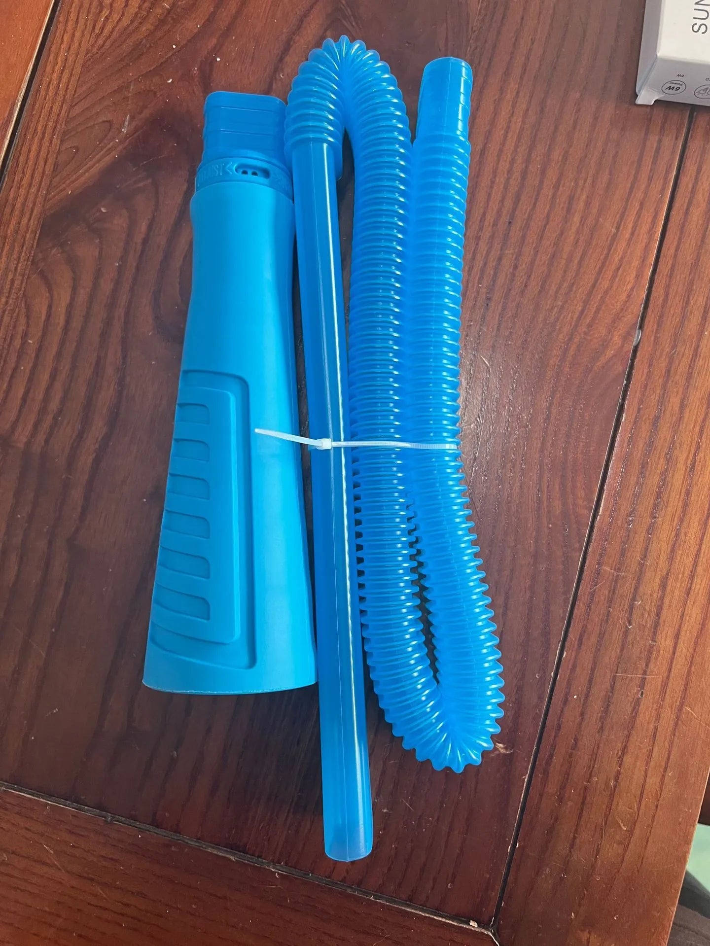 Blue plastic suction pipe cleaner for washing machines with 114cm length and round head design