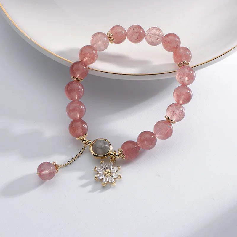 Korean style strawberry quartz bracelet with floral charm and silver accents