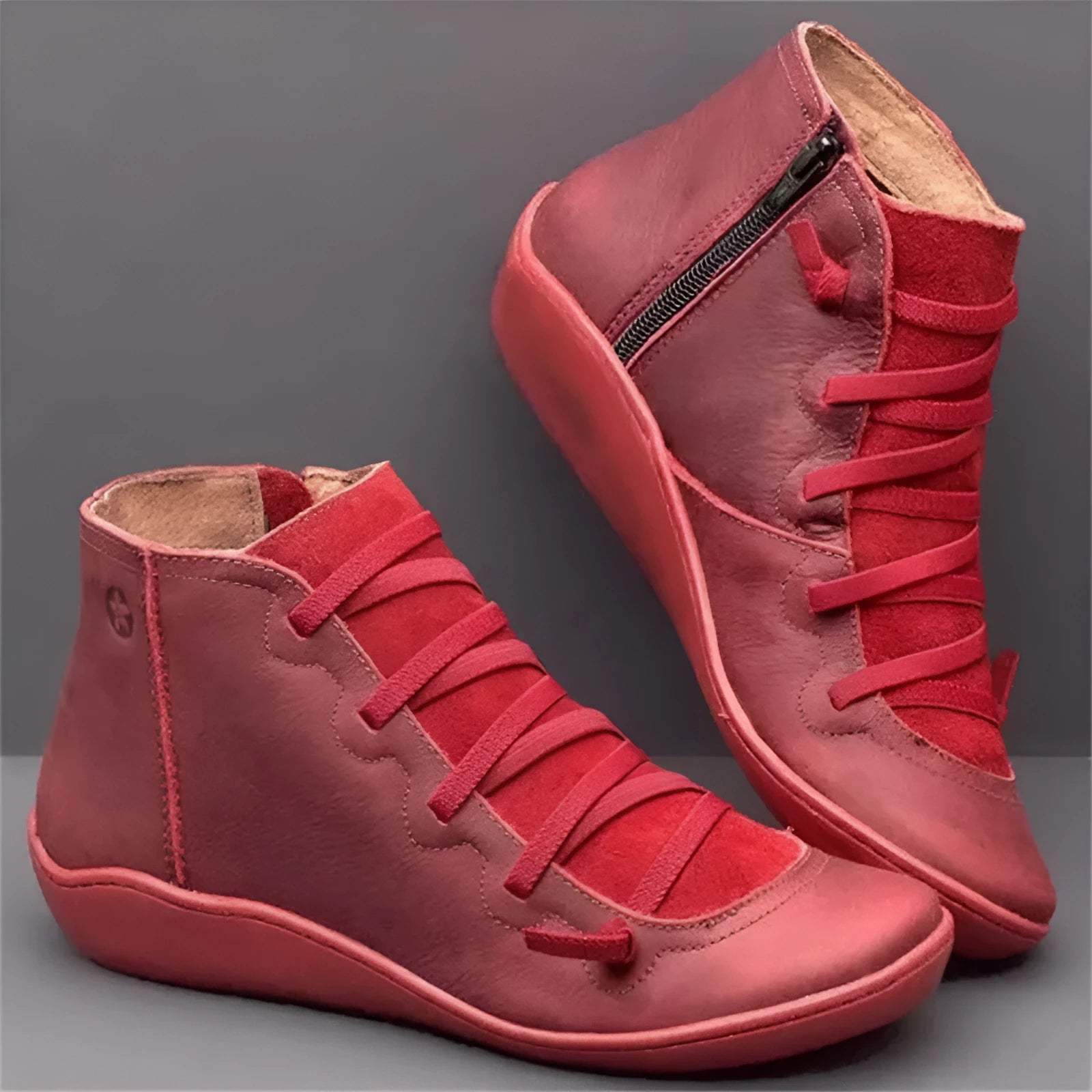 Women's casual ankle booties with a round toe, wedge heel, PU upper, and rubber sole in a selection of colours.