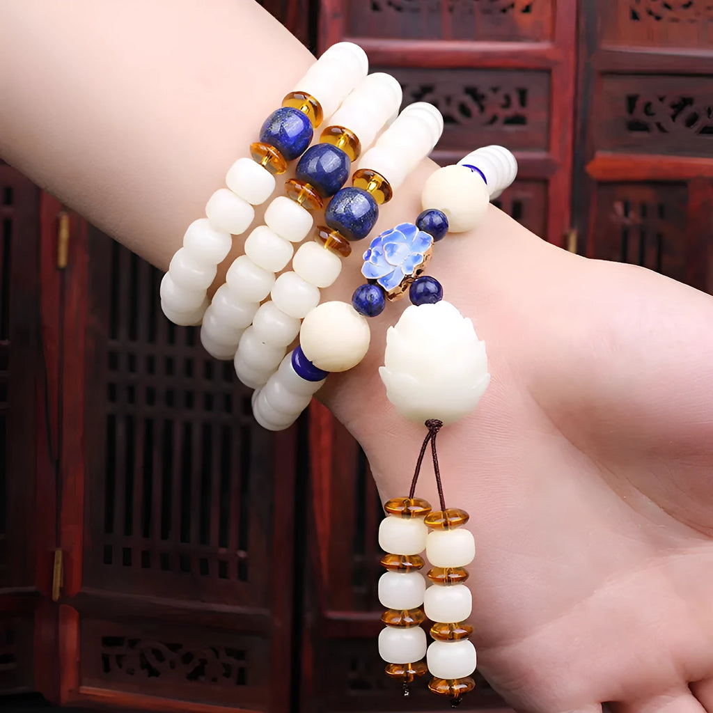 White jade Bodhi beads long bracelet with 6x8mm beads, showing various style options.