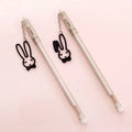 Gel pen with animal pendant charm, showing 0.38mm tip and 17cm plastic barrel.
