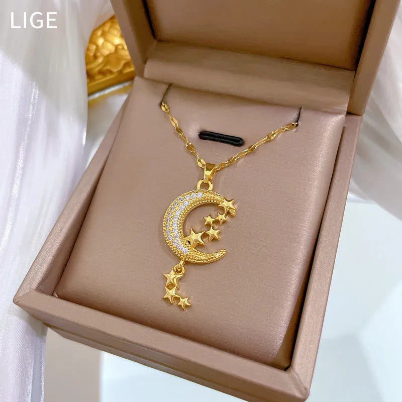 Stainless steel and copper moon pendant necklace with geometric diamond pattern and tassel design