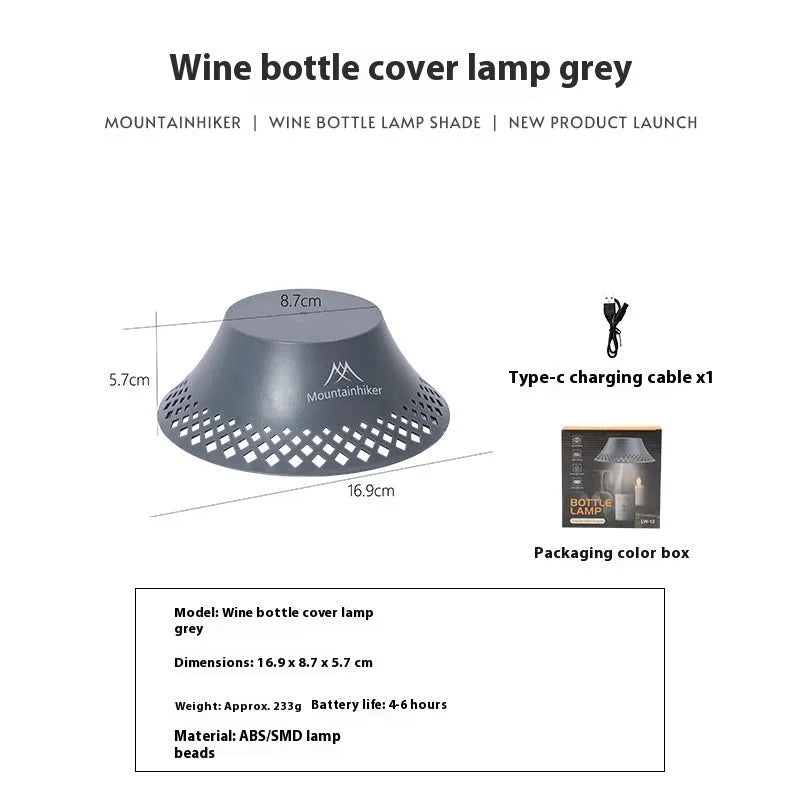 Beige wine bottle shaped camping lantern with USB-C charging port and compact dimensions