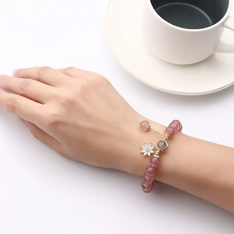 Korean style strawberry quartz bracelet with floral charm and silver accents