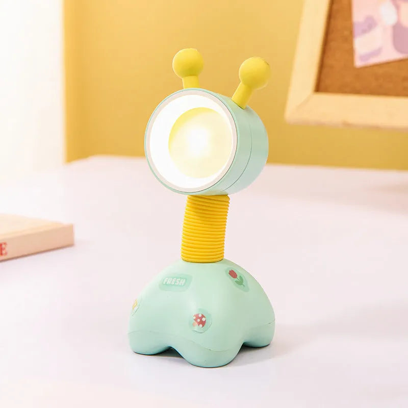 Cartoon animal magnetic night lamp with adjustable head on metallic surface