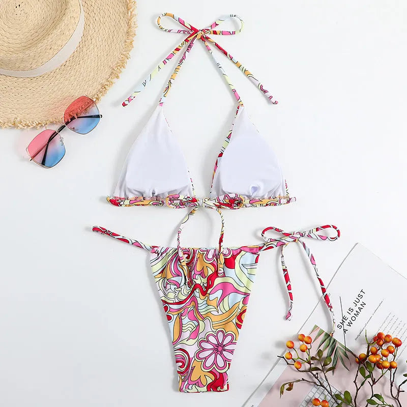 Women's triangle printed bikini with halter neck top and separate bottom in multicolour