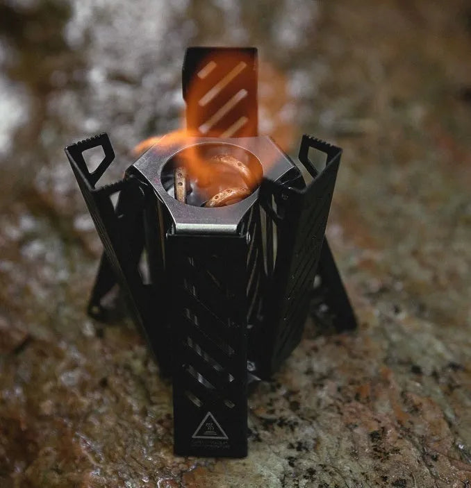 Foldable hexagon alcohol stove in black or silver for outdoor camping