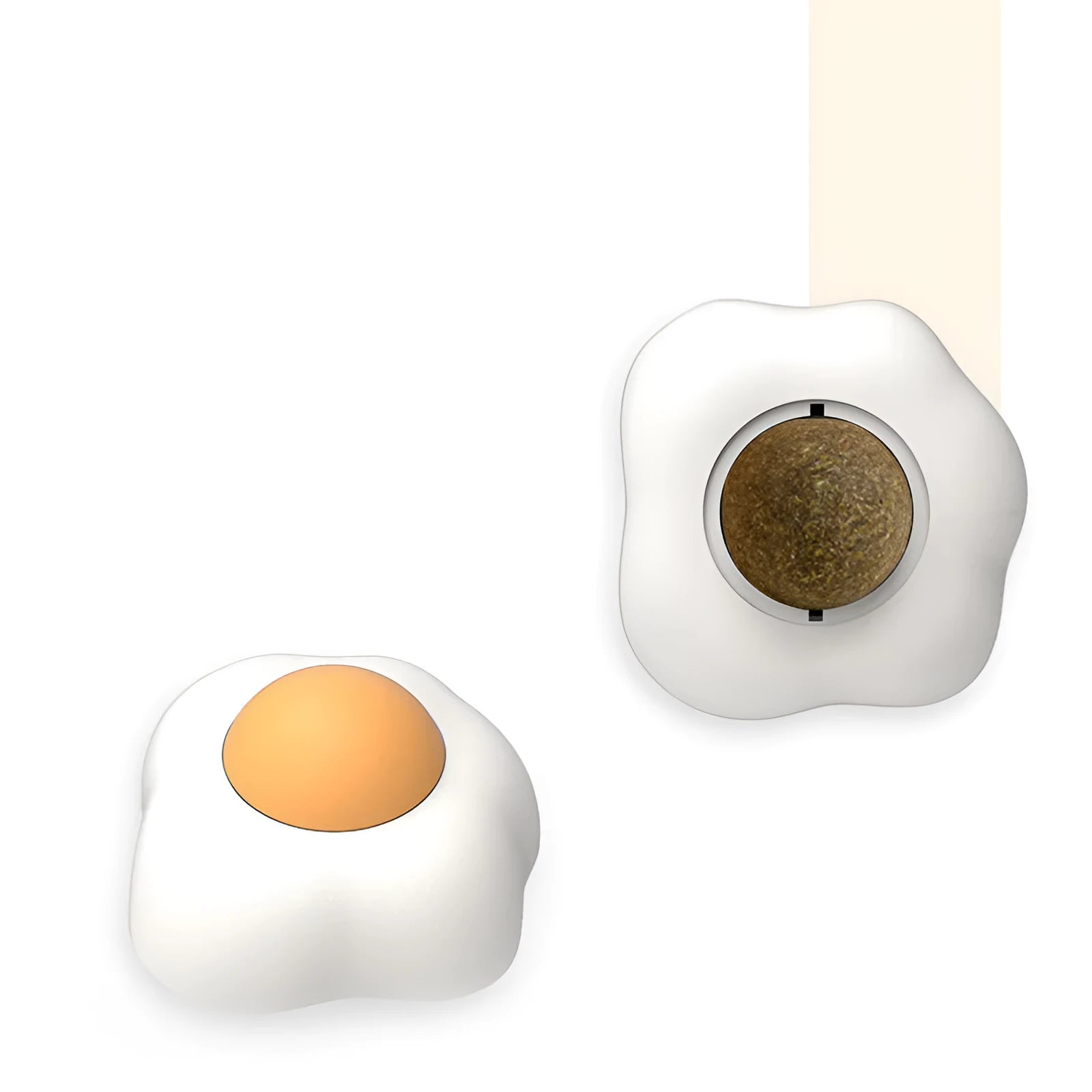 Interactive catnip ball toy with soft plush exterior mounted on wall surface