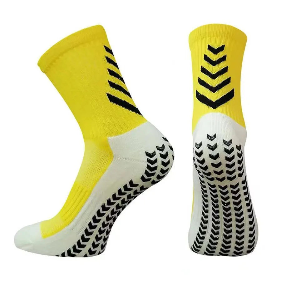 Men's mid-calf athletic socks with geometric patterns and silicone anti-slip grips