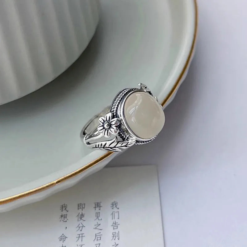 Adjustable copper ring with imitation white chalcedony stone and vintage styling