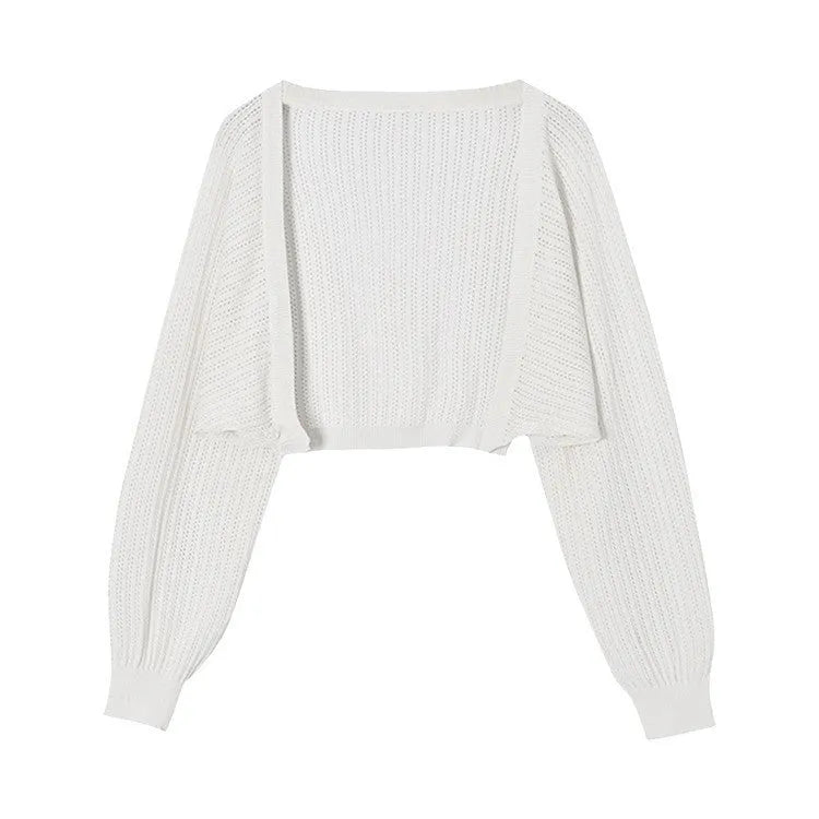 Women's linen blouse with hollow-out design and long lantern sleeves in apricot colour