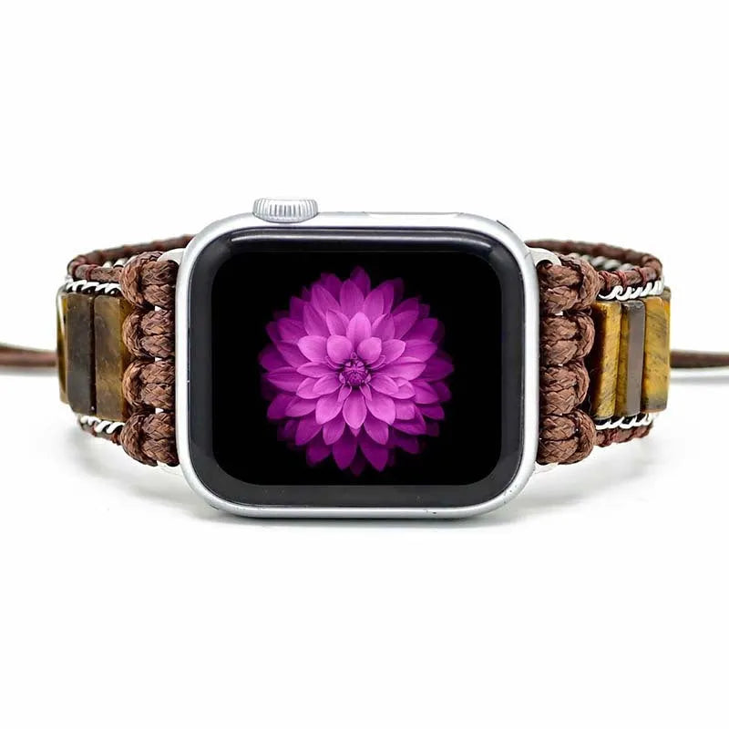 Men's adjustable textile watch strap with rectangular tiger eye stone, showing bohemian design and clasp detail.