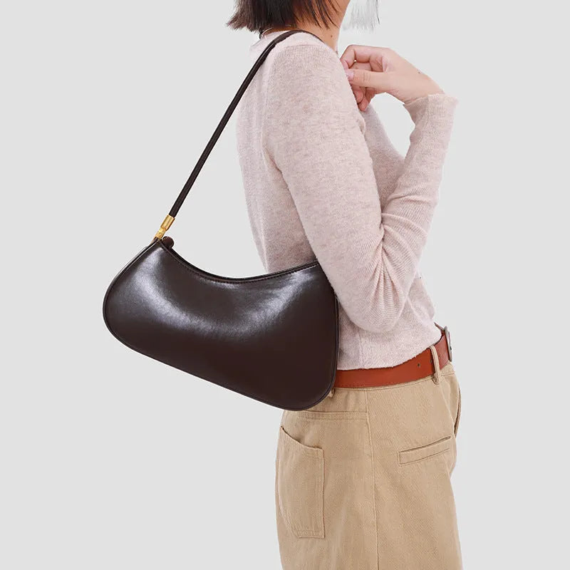 Women's retro oval underarm bag in PU leather with single shoulder strap and sandwich pockets
