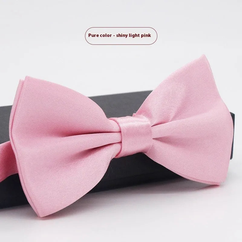 Solid colour polyester bow tie with flat head design measuring 12cm by 6cm