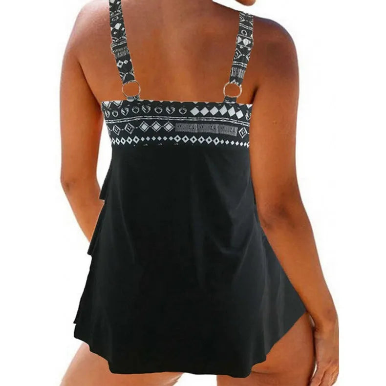 Plus size women's split cut swimsuit with double shoulder straps and a bow, shown in picture colour.