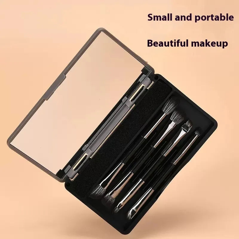 Makeup brush set in case with mirror showing 4 or 5 artificial fibre brushes in silver, gold or sparrow design