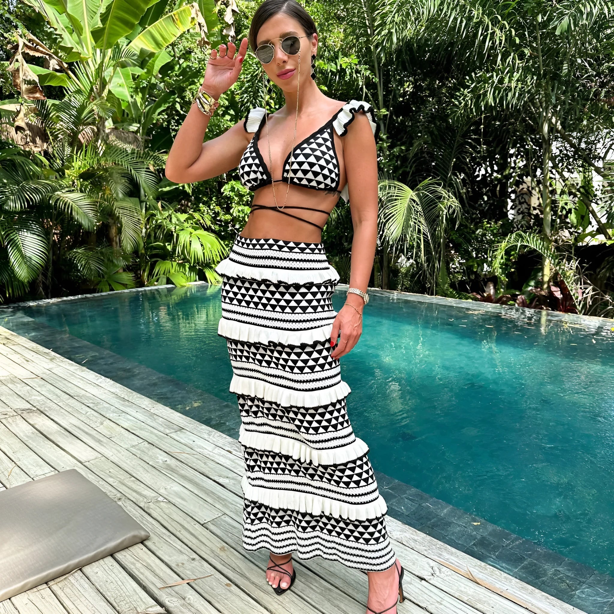 Black and white striped cotton bikini set with ruffled spaghetti strap top and long knitted skirt for women