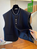 Beige loose-fitting polyester waistcoat with pockets on a hanger