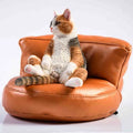 Small 7.5cm lazy cat ornament with sofa on car dashboard