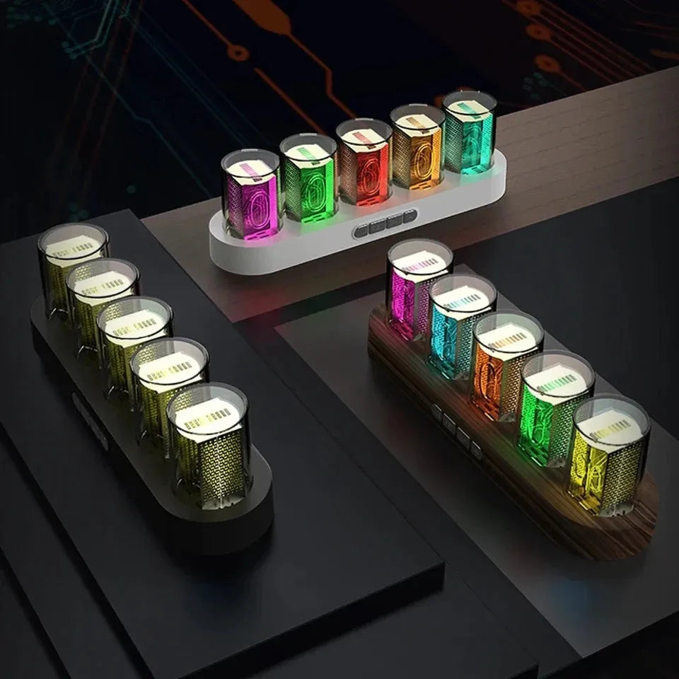RGB LED digital clock showing colour-changing display on desk with black plastic casing