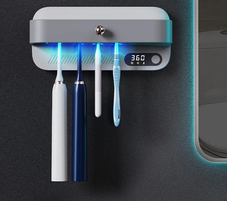 White wall-mounted smart UV toothbrush steriliser holder with USB port and button.
