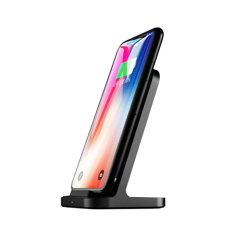Dark grey vertical wireless charging stand for Apple iPhones on desktop