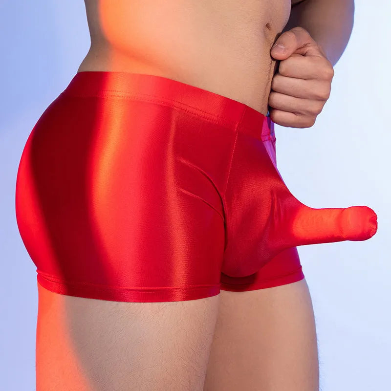 Red men's boxer shorts with elephant nose design, made from thin breathable nylon fabric.