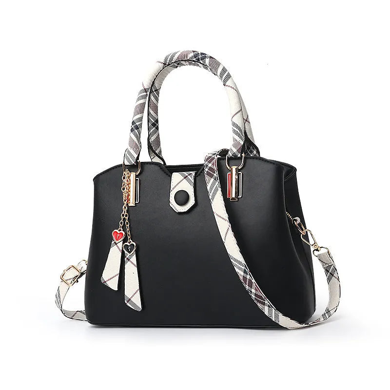 Large-capacity ladies PU Boston handbag with zipper and metal trim, medium size, available in multiple colours