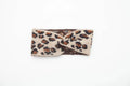 Women's leopard print acrylic bow hair band 22x10cm on a neutral background