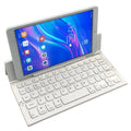 Black folding wireless Bluetooth keyboard for tablets showing compact 5.8-inch design with aluminium bottom and numeric keypad