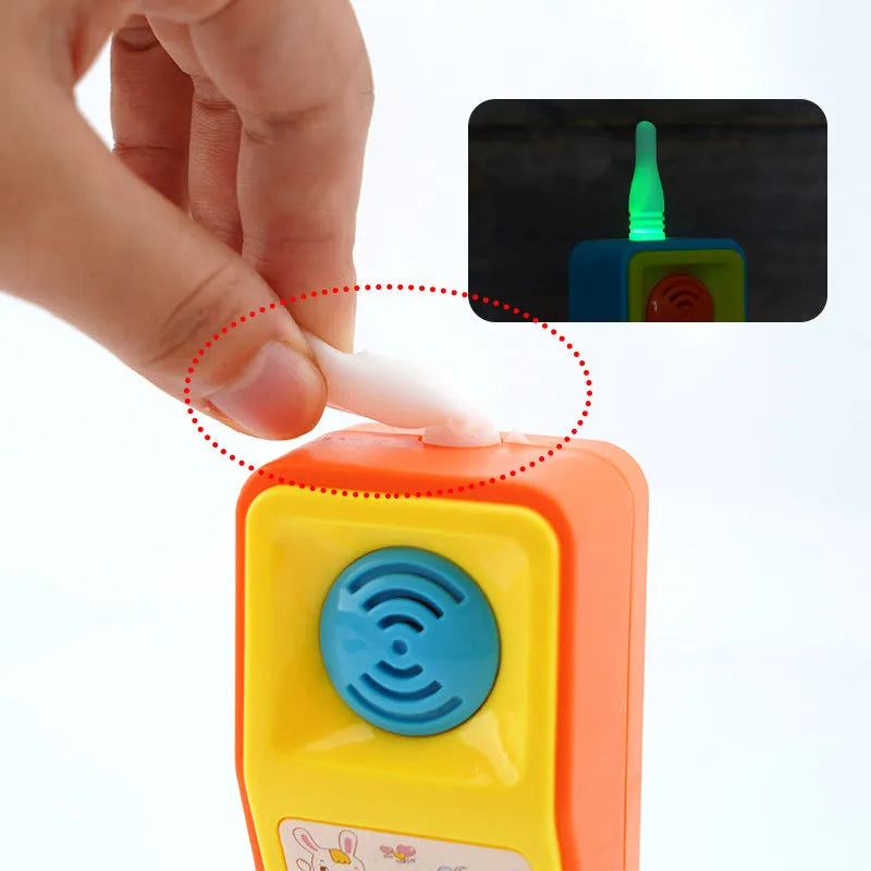 Children's educational toy with sound and light features showing cartoon animal design