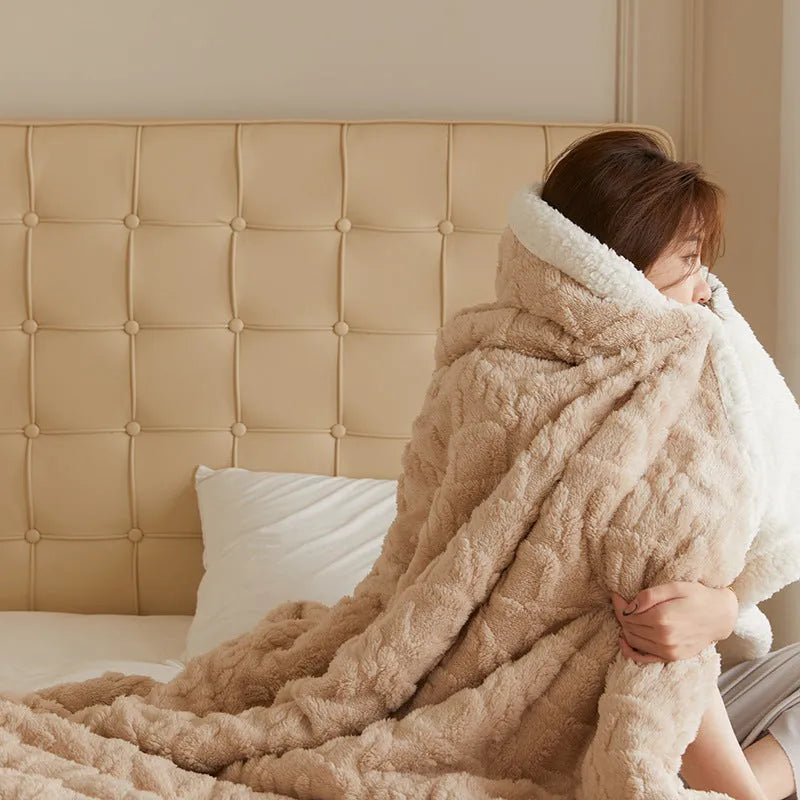 Polyester thermal flannel blanket in tea green colour on bed