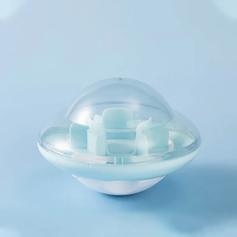 Blue pet tumbler ball toy with visual cabin and labyrinth column on floor