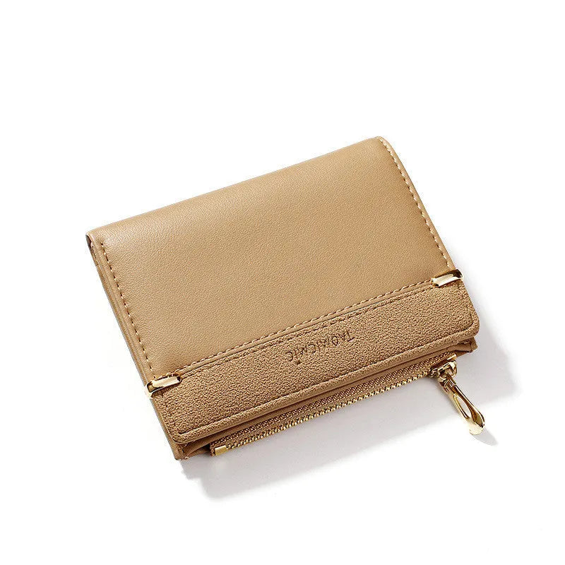 Short ladies wallet with zipper closure showing multi card slots and compartments in PU leather