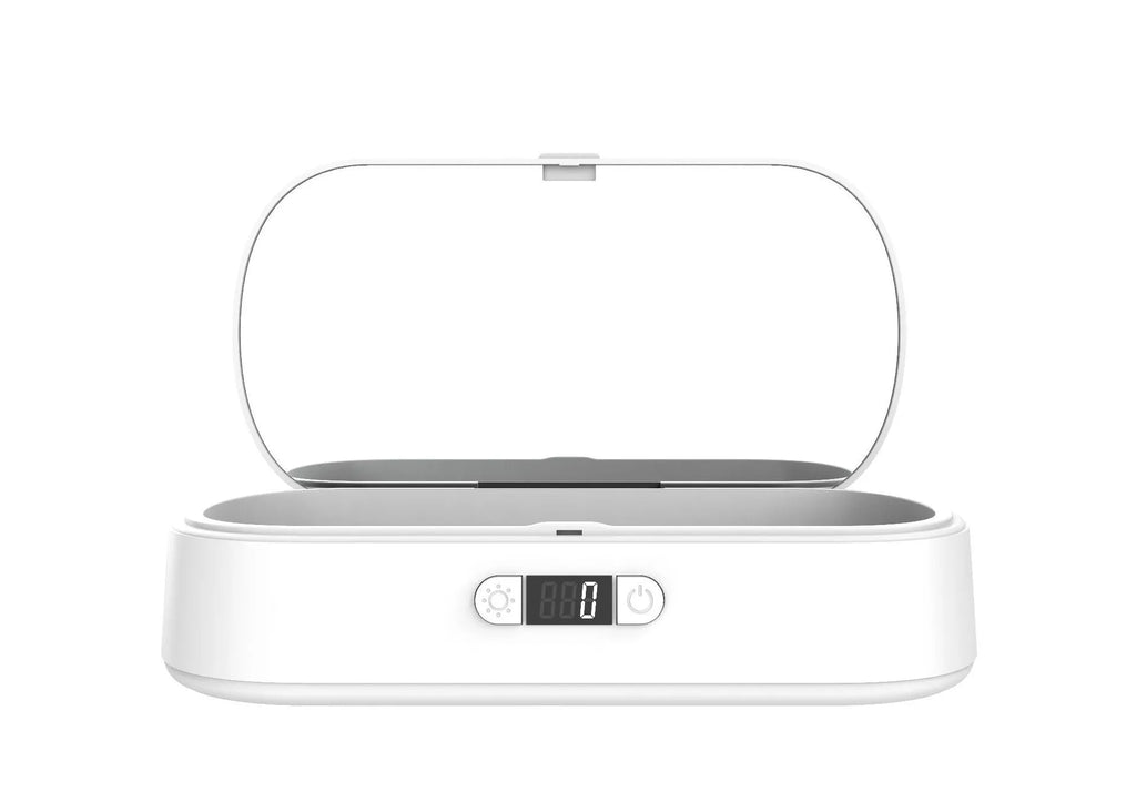 White UV wireless disinfection and charging box for sterilising mobile phones and personal items.