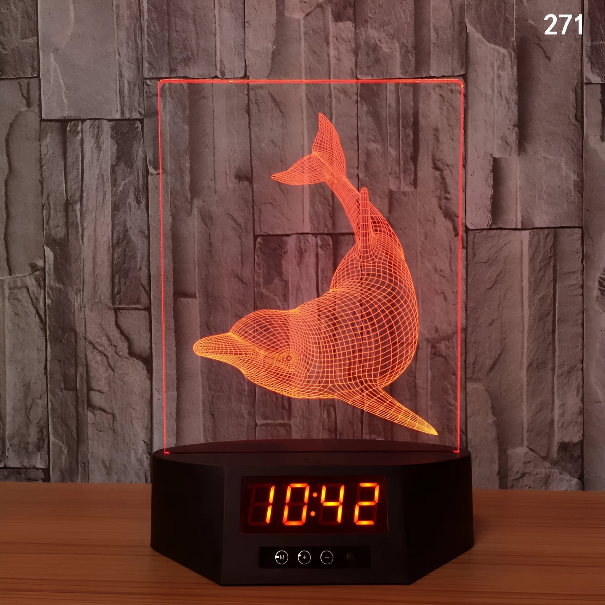 3D glowing electronic dolphin night light with remote control on table