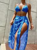 Floral three-piece bikini swimsuit for women in polyester with top, pants, and skirt in blue