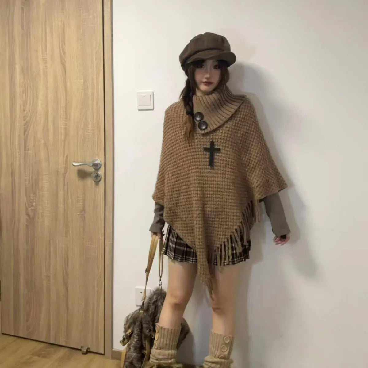 Women's triangle shawl cape in plush cashmere blend fabric with tassel detailing