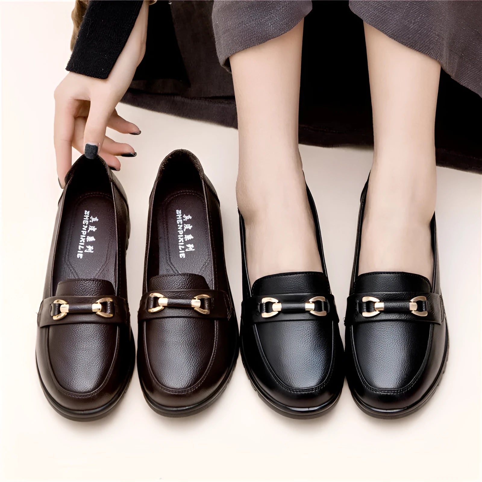 Black soft leather casual pumps with a round toe, flat rubber sole, and shallow slip-on design.