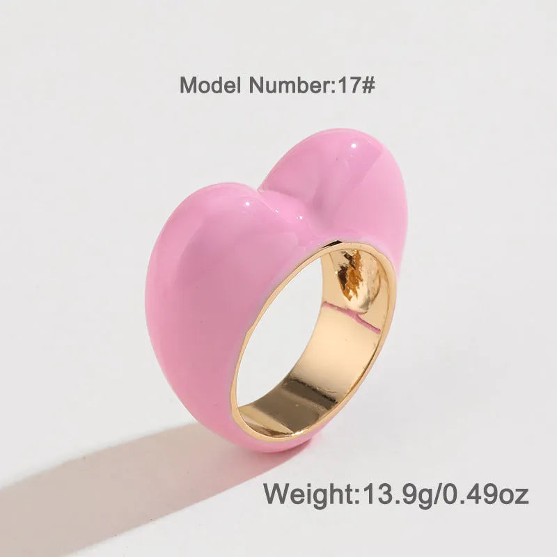 Heart-shaped three-dimensional enamel ring in zinc alloy showing raised colourful design